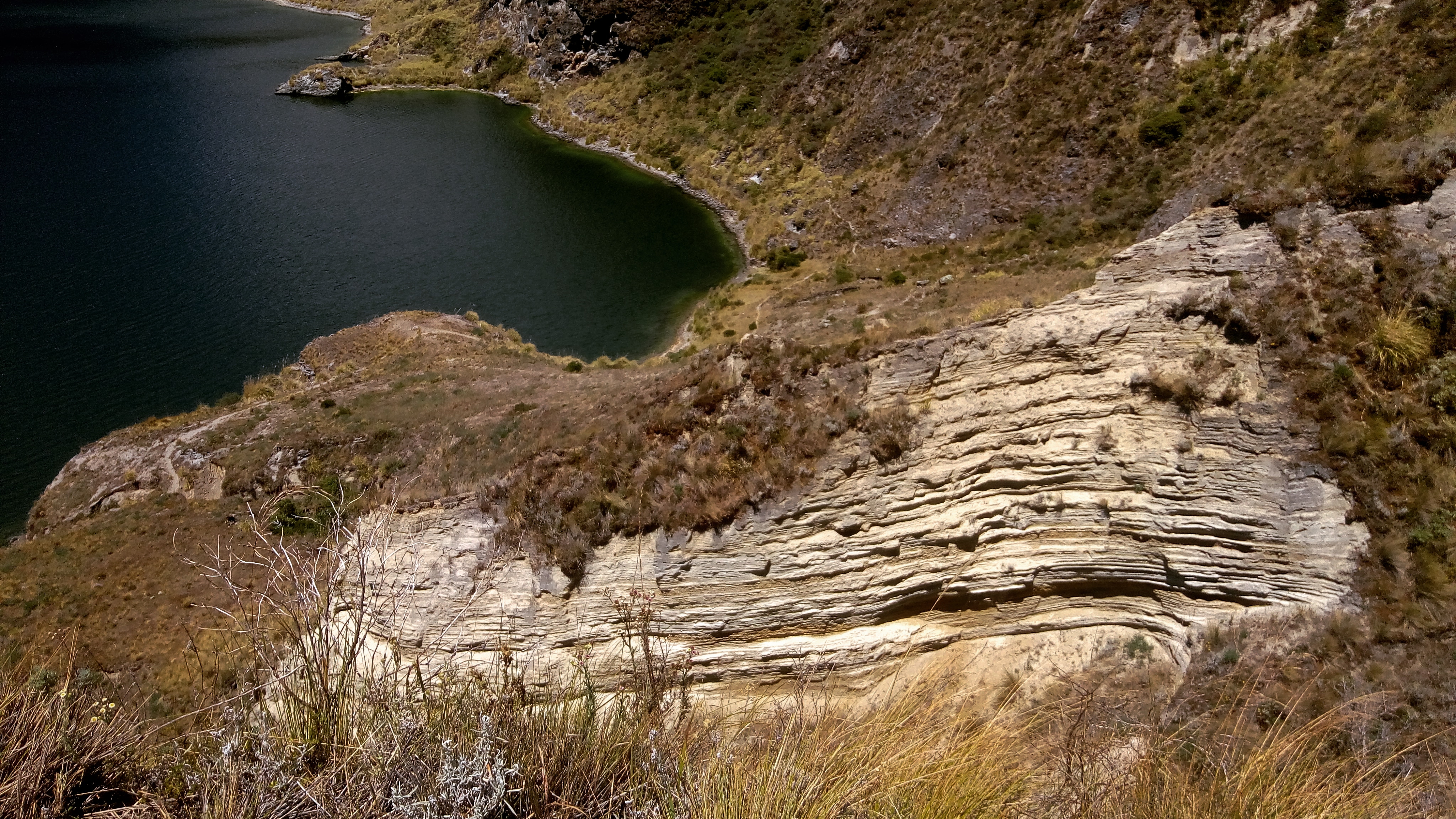 rock face over a lake